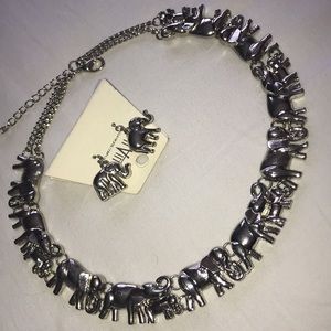 Beautiful silver tone set of necklace and earrings